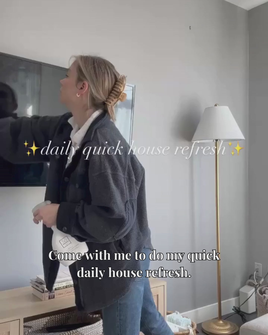 Woman doing a daily refresh of her home using Só Luxury products in the kitchen and living room